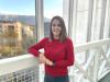 Anna-Lena Nadler smiling in front of a balcony